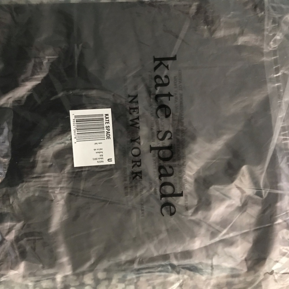 Black leather pebbled Kate spade crossbody- 2 pockets inside. Measures 10”x6”.